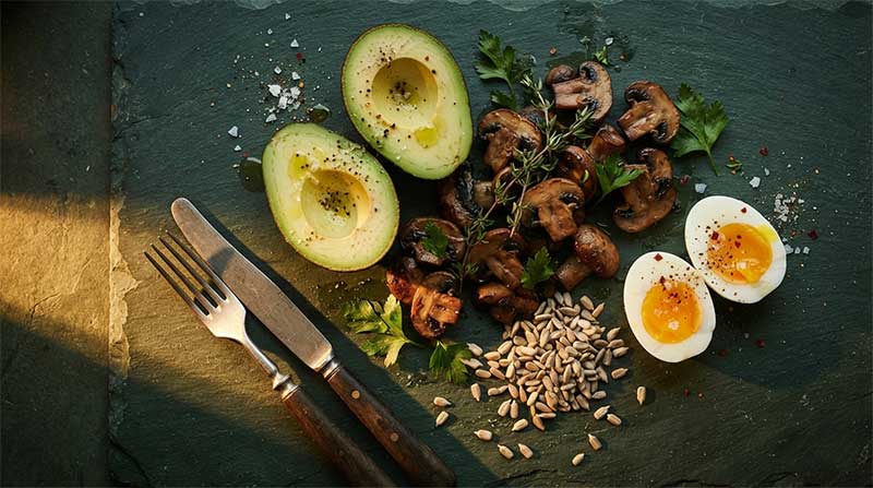 Whole food sources of pantothenic acid including avocado, mushrooms, eggs and sunflower seeds